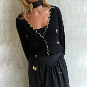 Black Pointelle Knit Cardigan With Gold Fish